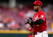 Reds put Jeimer Candelario on IL, bring up Amed Rosario