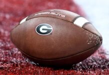 Crash survivor Bowles, Georgia settle; Jalen Carter suit continues