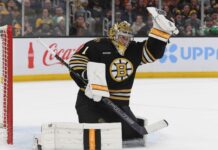 Swayman gets win in Bruins’ home opener after camp holdout