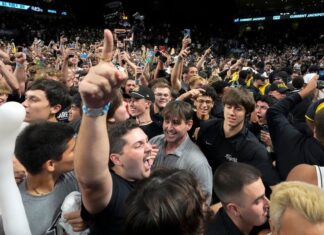 Fans storm court after UCF jabs upset of Texas A&M in SEC